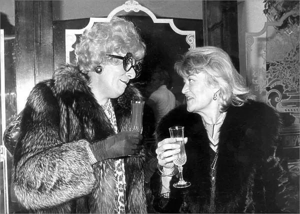 Barry Humphries as Dame Edna Everage with Jean Rook at Selfridges