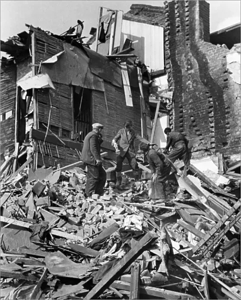 Devastation caused by a bomb. Rescue workers on the scene soon after the incident worked