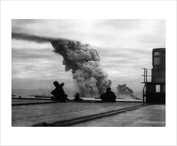 Billowing smoke marks the end of the ammunition ship Mary Luckenbach