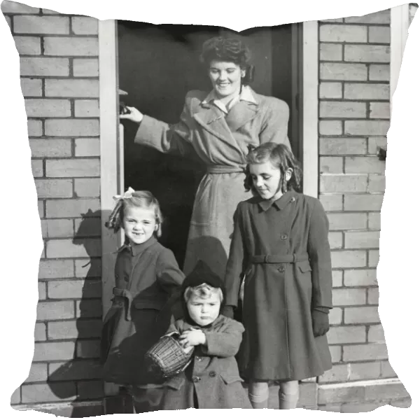Picture shows Mrs Edna Ford with her children, leave their house in Knowle Park, Bristol