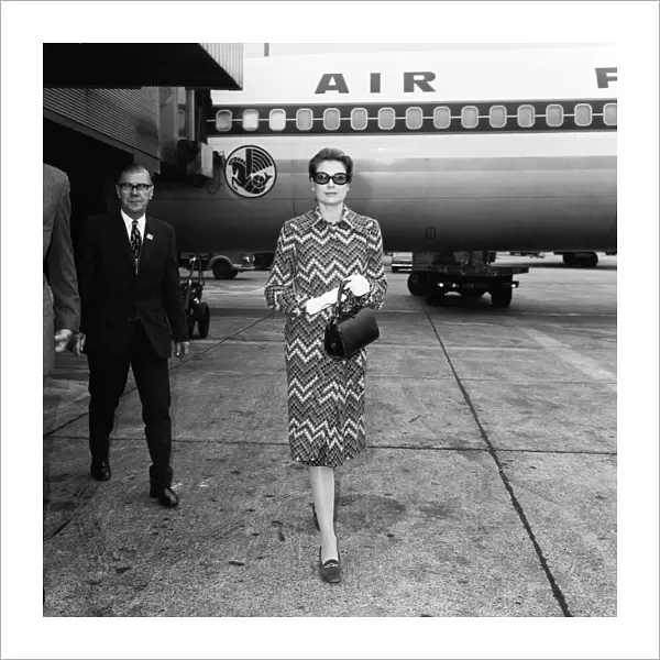 Princess Grace of Monaco arriving from Paris for a short