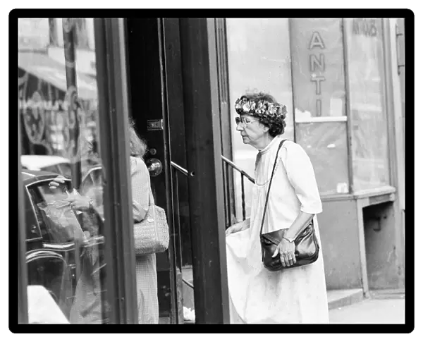 Senior Citizen seen wearing a crown of flowers, New York, USA, June 1984