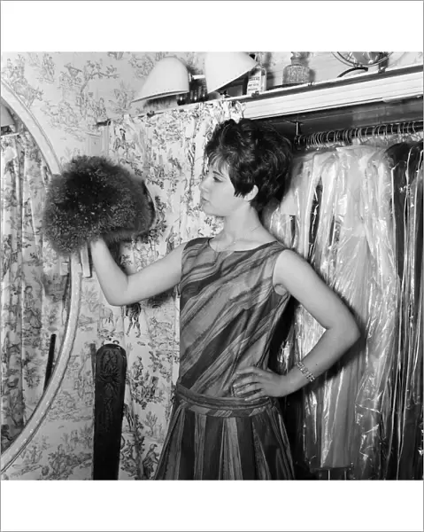 14 year old singer Helen Shapiro, trying on clothes at 'Mary Fair'dress shop