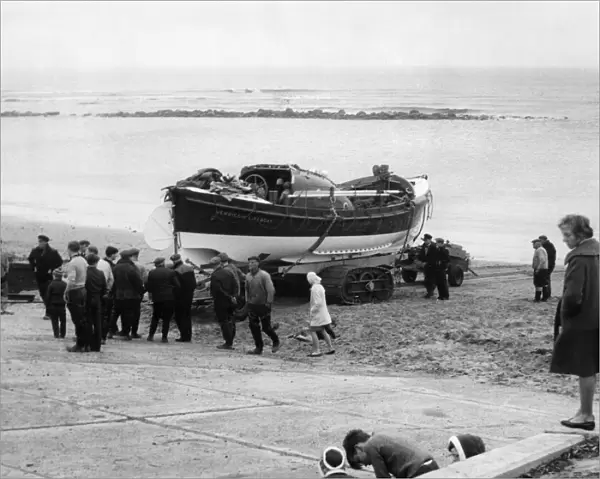 The Newbiggin lifeboat Richard Ashley is hauled back to its shed after a rescue attempt