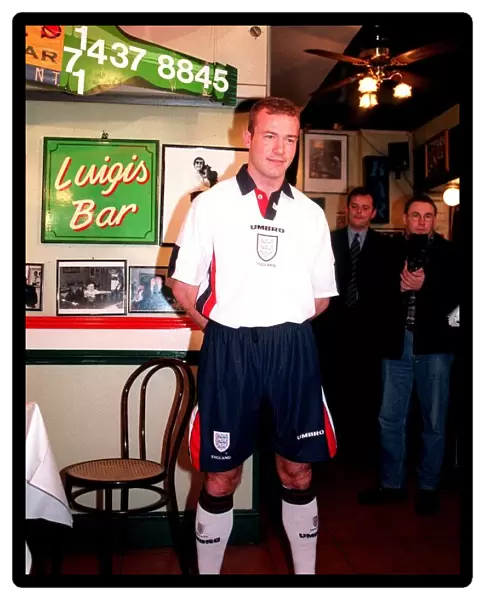 ALAN SHEARER MODELLING THE NEW 1997 ENGLAND FOOTBALL STRIP