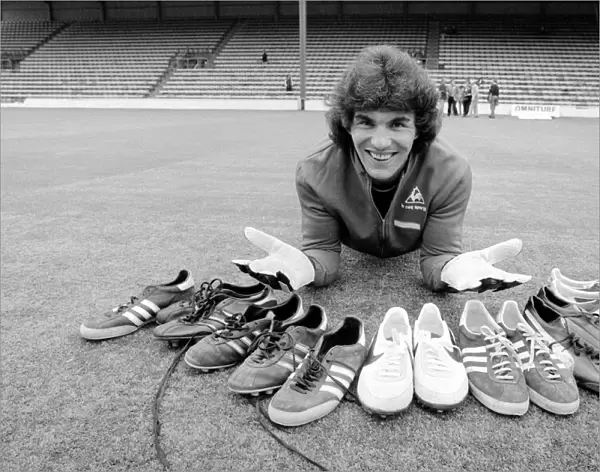 Chelsea goalkeeper Petar Barota in a state of confusion about which boots to wear