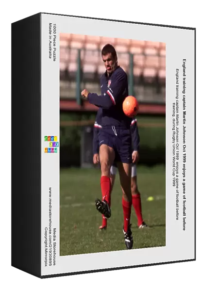England training captain Martin Johnson Oct 1999 enjoys a game of football before
