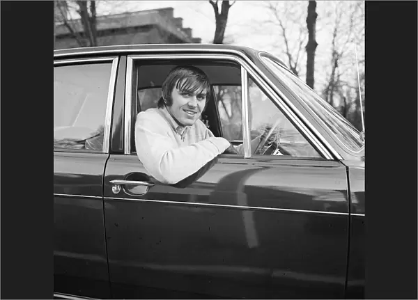 Jimmy Rimmer of Manchester United sitting in his car