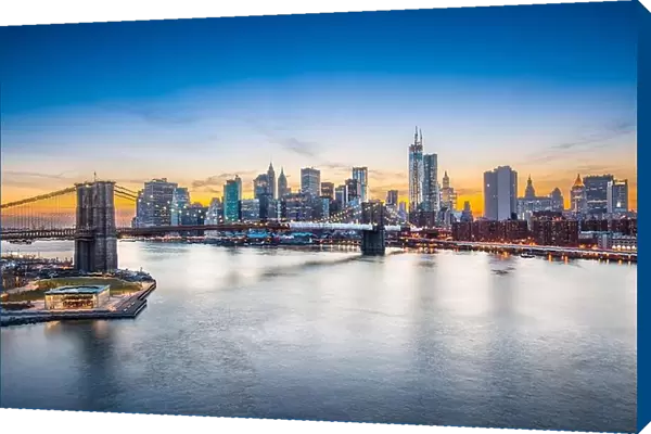 Famous view of New York City over the East River towards the financial district in the borough of Manhattan