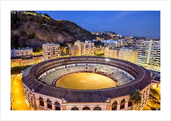 Malaga, Spain cityscape and bullring at Plaza del Toros