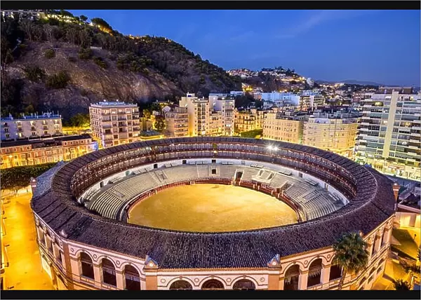 Malaga, Spain cityscape and bullring at Plaza del Toros