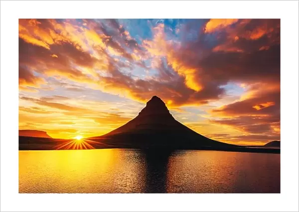 Incredible landscape with Kirkjufell mountain and colorful sunset sky on Snaefellsnes peninsula near, Iceland
