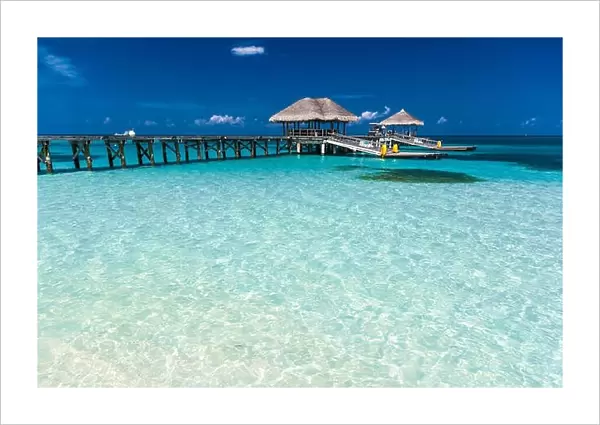 Amazing beach in Maldives with luxury water villas. Exotic background concept