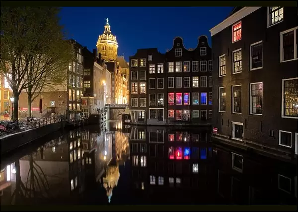 Amsterdam skyline in historical area at night, Amsterdam, Netherlands