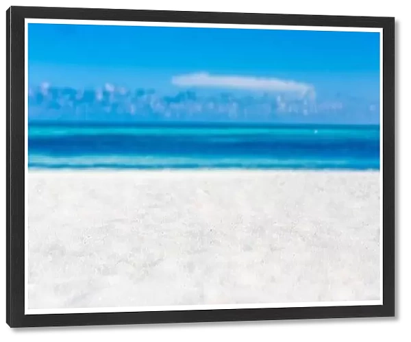 Summer beach background. Sand and sea and sky concept. Minimal island beach, white sand under blue sky with sea view