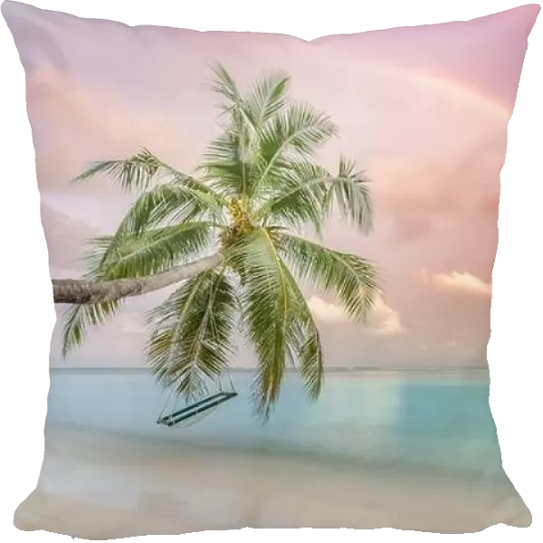 Perfect tropical landscape, sunset beach with palm tree and swing hanging under colorful rainbow. Romantic beach landscape