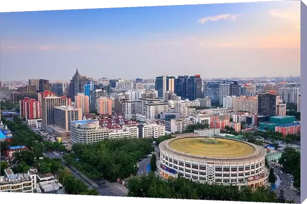 Beijing, China cityscape and arena at dusk