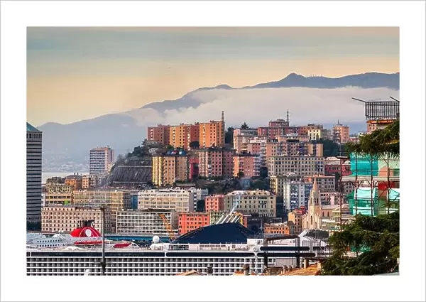 Genova, Italy cityscape wity misty mountains