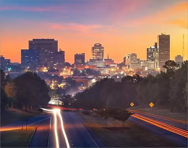 Columbia, South Carolina, USA downtown city skyline from above roadways at dawn
