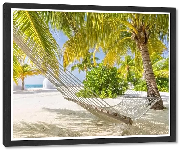 Beach hammock between palms on the beautiful tropical beach, tranquility and relaxation summer travel vacation concept