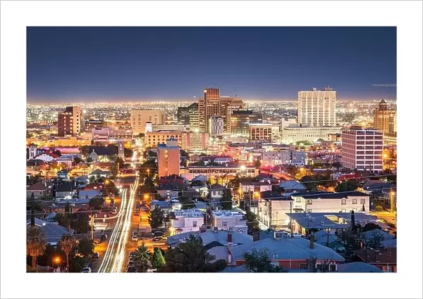 El Paso, Texas, USA downtown city skyline at dusk with Juarez, Mexico in the distance
