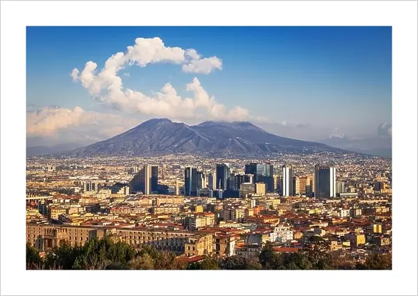 Naples, Italy with the financial district skyline under Mt. Vesuvius in the afternoon