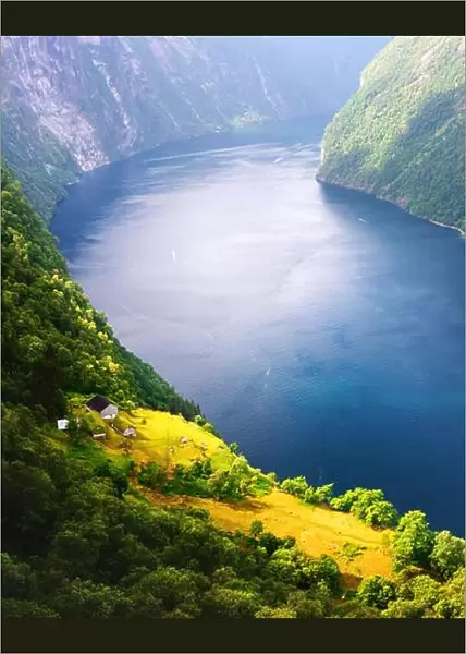Breathtaking view of Sunnylvsfjorden fjord and famous Seven Sisters waterfalls, near Geiranger village in western Norway