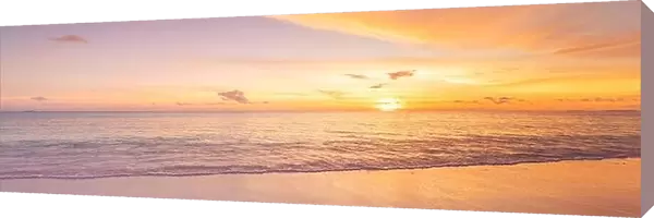 Beautiful sunset on the beach and sea. Tropical beach at beautiful sunset. Nature background. Exotic landscape, shore, coast, calm waves, soft sand