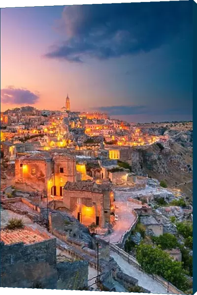 Matera, Italy. Cityscape aerial image of medieval city of Matera, Italy during beautiful sunset