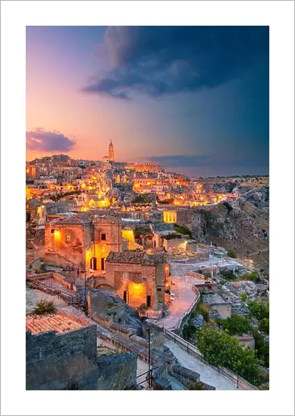 Matera, Italy. Cityscape aerial image of medieval city of Matera, Italy during beautiful sunset
