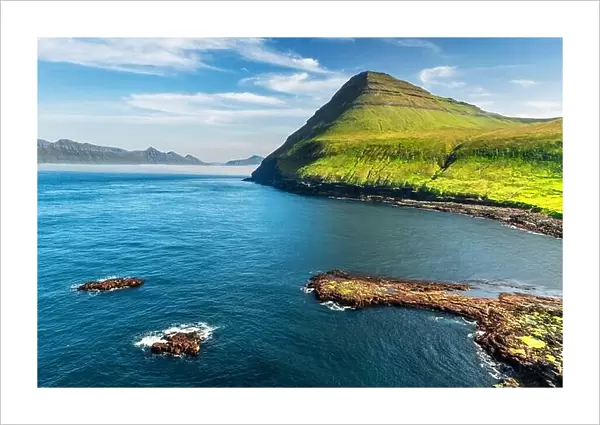 Picturesque view on green faroese islands mountains near village of Gjogv on the Eysturoy island, Faroe Islands, Denmark. Landscape photography
