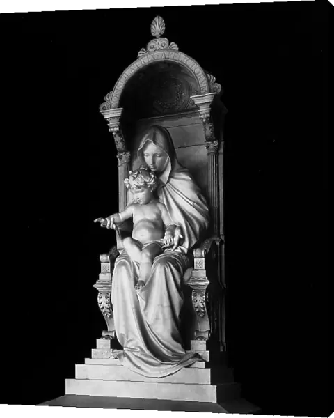 The Madonna enthroned with Child. Work by Giulio Monteverde, belonging to the Monument of Domenico Balduino, located in the Cemetery of Staglieno, near Genoa