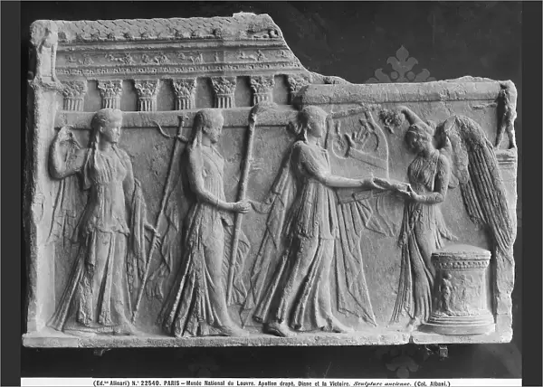 Apollo as a cithara player, Diana and a figure representing Victory: bas-relief on display at the Louvre Museum, Paris