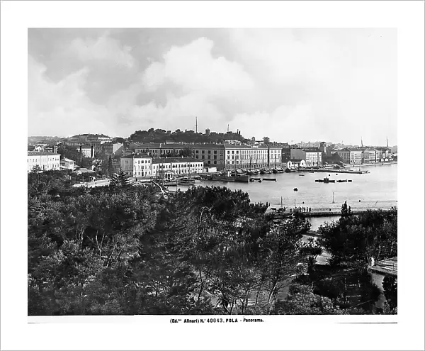 Panoramic view of the port of Pola, with moored boats, photographed during the period of Italy's reign in Istria