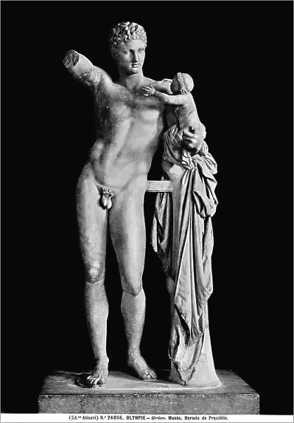 Sculpture representing Hermes playing with his brother Dyonisus, work attributed to Prassitele. Sculpture preserved in the Olympia Museum