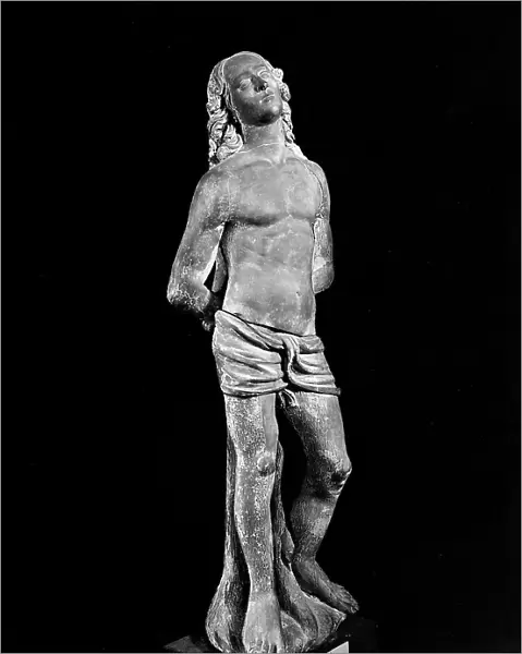 Statue representing St. Sebastian. Terracotta by an anonymous artist from the Tuscan sixteenth century preserved in the Church of S. Giovanni Evangelista at Montelupo, province of Florence