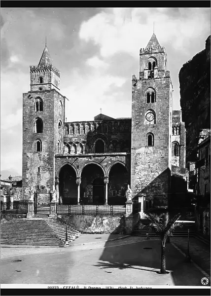 View of the faade of the Cathedral of Cefal, Sicily, with two massive bell towers and a portico surmounted by two rows of small blind arches