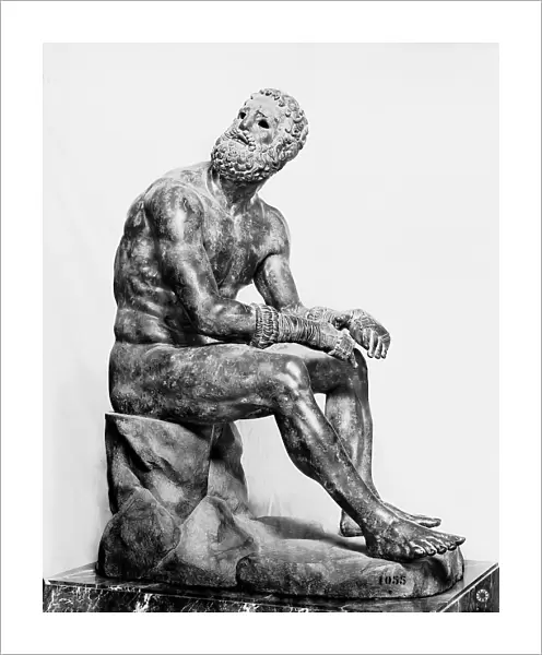 Fighter resting, bronze statue of Augustinian era taken from the baths of Constantine in Rome and preserved in the National Roman Museum (ex Collegio Massimo)
