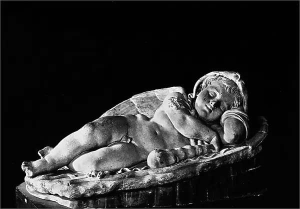 Statue of Cupid with Hercules features. Roman copy of a Greek original exhibited at the Archaeological Museum in Turin