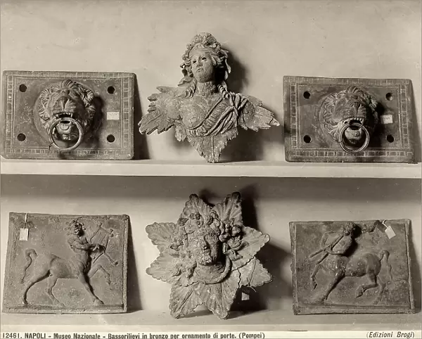 Bronze bas reliefs for door ornaments from Pompeii. National Archaeological Museum in Naples