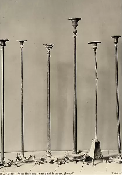 Bronze candlesticks from Pompeii exhibited at the National Archaeological Musuem in Naples