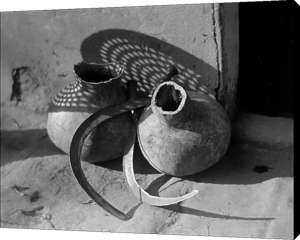 Clay pots and sickle; Photo studio