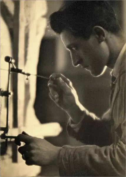 Young man taking a photograph. Postcard sent by the author to Vincenzo Balocchi