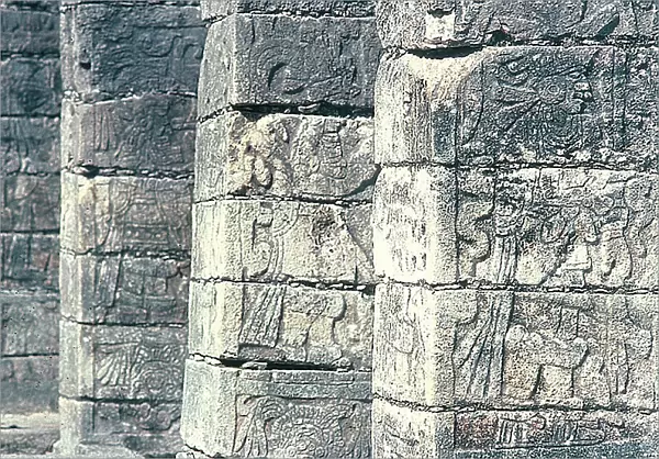Chichen Itza: columns carved with bas-reliefs of the Warriors Temple, called also 'Temple of the 1000 Columns' (total and architectural). The Toltec influence is evident
