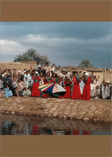The Dervishes dance in traditional costumes, a village in the oasis of Fayoum