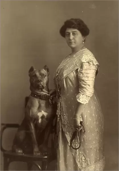 Portrait of a woman (probably Mrs. Spadoni) with a dog seated on a chair