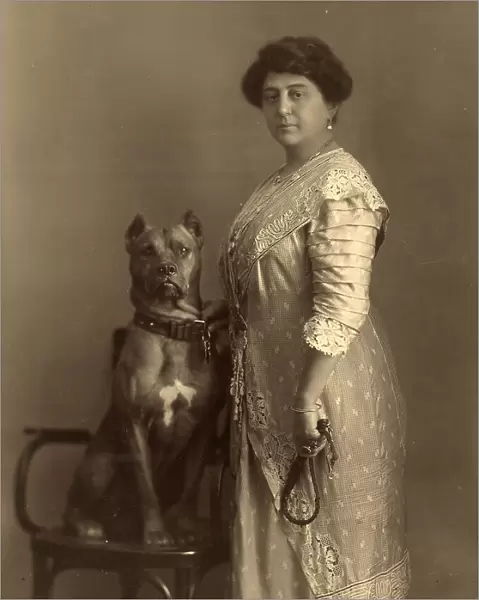 Portrait of a woman (probably Mrs. Spadoni) with a dog seated on a chair