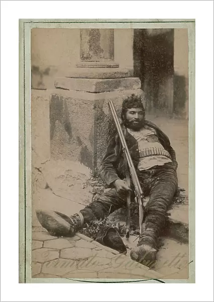 Post mortem portrait of a brigand, lying on the cobblestones