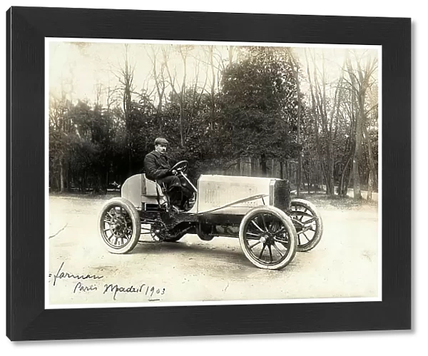 M. Farman at the steering wheel of an automobile on the occasion of the Paris-Madrid race of 1903