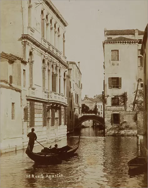 Gondolier on Rio Sant'Agostino in Venice